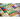 Emerald Skulls strategy game by Thunderworks Games featuring colorful skull tokens and game components on a game board.