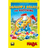 HABA Dragon's Breath: The Hatching children's game featuring colorful dragon eggs and game components on a wooden surface.