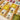 Family board game Kanagawa by IELLO featuring colorful artwork and game components on a wooden table.