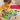 Children's game Monza by HABA featuring colorful circular pieces arranged on a game board.