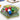 Family game Orbis by Space Cowboys featuring colorful, circular game pieces on a wooden table.