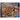 Ravensburger Aimee Stewart Treasure Trove adult puzzle featuring colorful, detailed artwork with treasure and fantasy elements.
