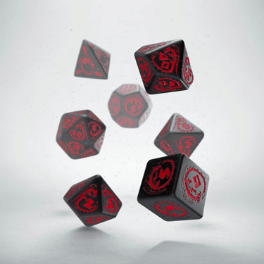 Black and red dragon-themed dice set by Q Workshop, featuring RPG dice with intricate dragon design for tabletop gaming.