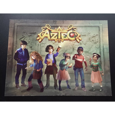 Aztec family game by Matagot featuring colorful illustrated tiles and game components for engaging gameplay.