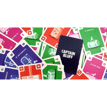 Captain Bluff family game by Helvetiq, featuring colorful game pieces and a game board with cards and tokens on a wooden surface.