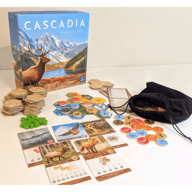 Abstract game Cascadia Kickstarter Edition by Flatout Games featuring colorful animal tokens and a nature-themed game board.