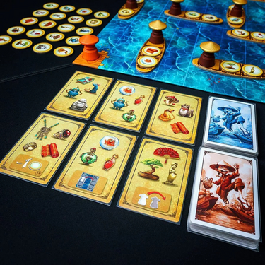 Family games from Blue Orange Dragon Market with colorful game pieces and vibrant packaging.
