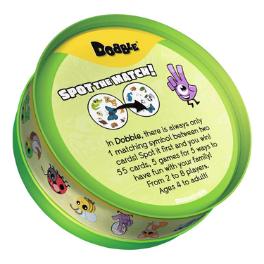 Children's game Dobble Animals by Zygomatic featuring colorful animal cards and game components on a table.