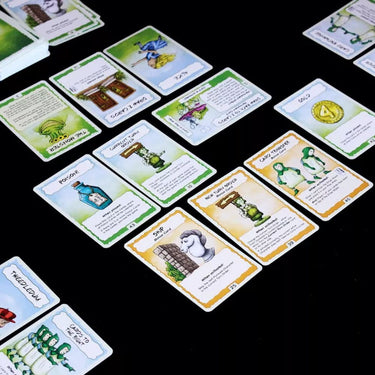 Family game Fast Forward: FLEE by Stronghold Games with colorful game pieces and a game board featuring a fleeing theme.