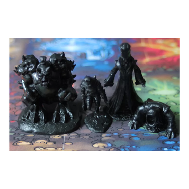 Repos Production Ghost Stories Black Secret strategy game box with artwork and game components laid out on a table.