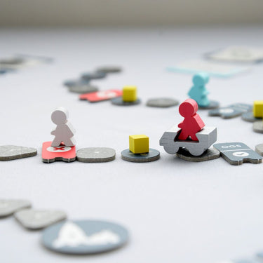 Image of Moon Adventure strategy game by Oink Games, featuring colorful game components and a game board with space-themed design.