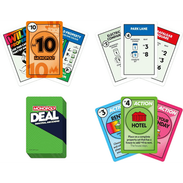 Hasbro Monopoly Deal family card game with colorful game cards spread out on a wooden table.