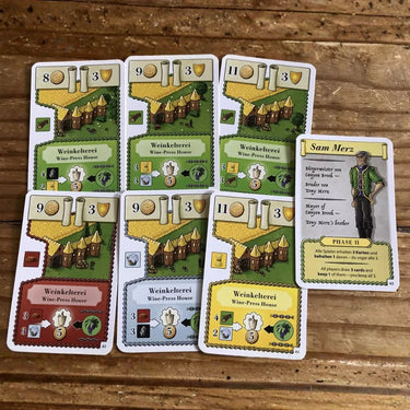 Strategy game box for Oh My Goods! Escape to Canyon Brook by Lookout Games, featuring colorful artwork and game components.
