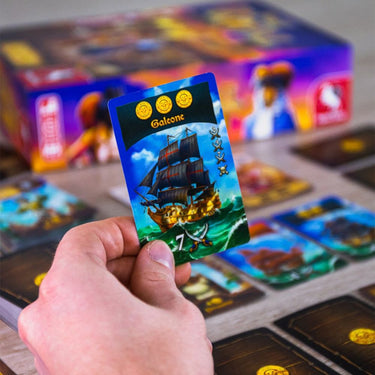 Family game box set, Port Royal: Big Box by Pegasus Spiele, featuring colorful illustrations and game components inside.