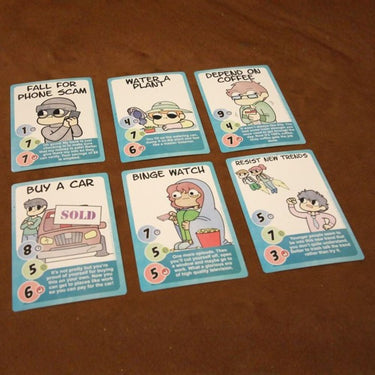 Pretending to Grownup party game by Jason Anarchy Games featuring colorful cards and playful adult-themed illustrations.