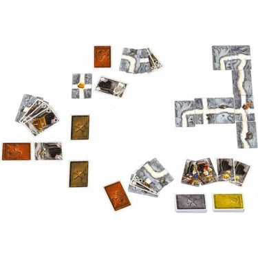 Players gather around a Saboteur party game by Amigo, featuring colorful cards and game pieces for strategic fun.