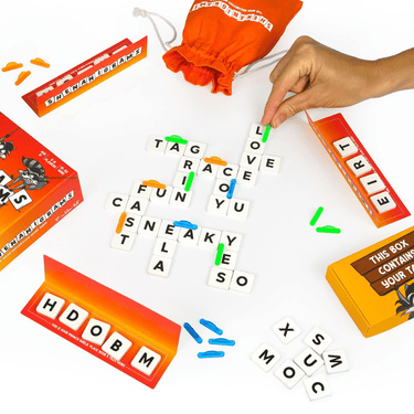 Image of Shenanigrams party game by Happy Yeti Games, featuring colorful cards with fun prompts for social gatherings.