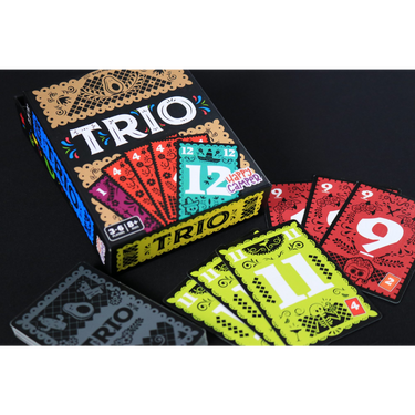 Family game Trio by Cocktail Games, featuring colorful cards and game pieces for fun family entertainment.