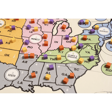 Strategic board game Votes for Women by Fort Circle Games featuring colorful game pieces and a detailed game board for historical gameplay.