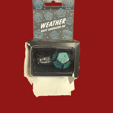 Weather Generator Die: Shimmering Blue/Turquoise (DAMAGED) - the backing card torn through around the lower edge of the blister, with the blister partly separated