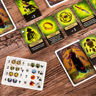 Family game box for Welcome to the Dungeon by IELLO, showing colorful artwork and game components on the front cover.