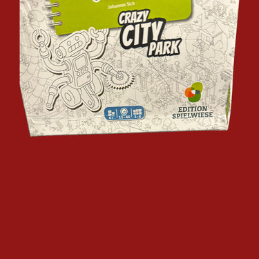 MicroMacro: Kids – Crazy City Park (DAMAGED) - crease across the lower front of the box with bumping along the left edge