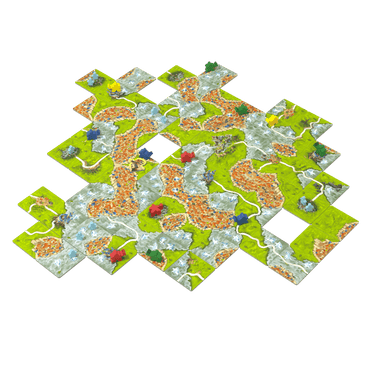 Family game board for Mists over Carcassonne by Z-Man Games, featuring medieval landscape and game tiles on a wooden table.