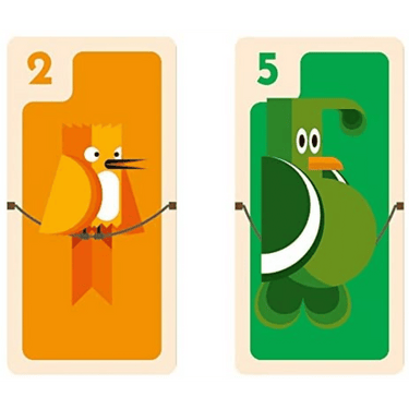 Helvetiq Papageno family game box with colorful artwork and game components on a table, showcasing a fun, engaging family game.