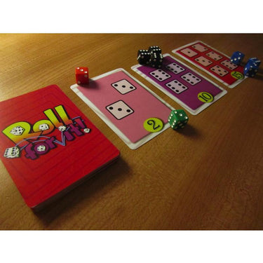Red Roll For It! 2nd Edition family game by Calliope Games, featuring colorful dice and game components on a table.