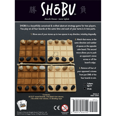 Abstract game Shōbu by Smirk & Laughter Games featuring wooden game boards and stones for strategic gameplay.