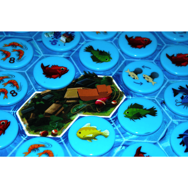Abstract game Tonari by IDW Games featuring colorful geometric shapes on a wooden game board.