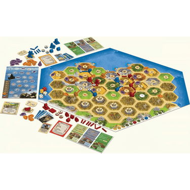 Catan: Legend of Conquerors family game box showing colorful artwork and game components on a table.